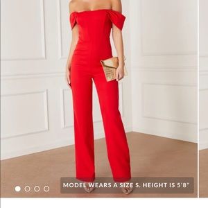 Red jumpsuit. From VICI. size large. Brand new with tags. $45
